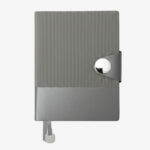 Grey A5 dual-texture PU notebook with magnetic closure, pen holder, and box packaging