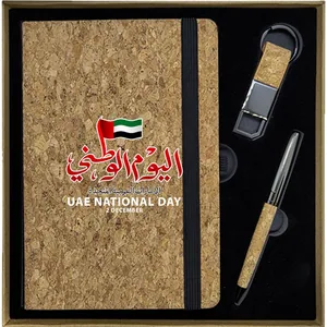 Cork notebook gift set with a key tag and pen in an open box, printed for UAE National Day