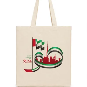 Canvas tote bag printed with a UAE flag ribbon and skyline design